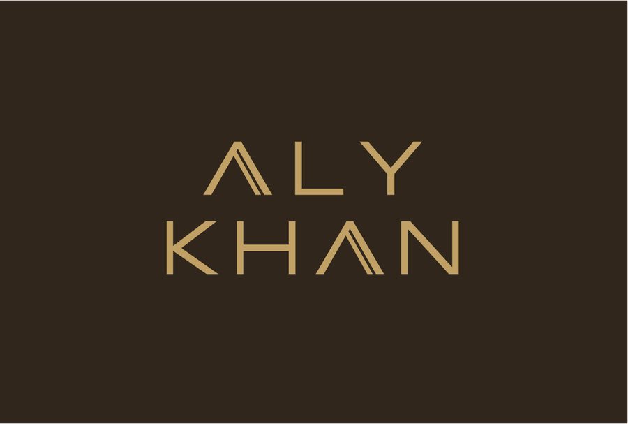 Aly Khan stacked logo in gold on earth brown